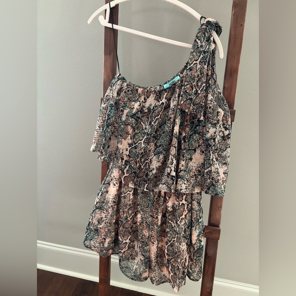 Karlie One Shoulder Romper. Size large. Never worn, still has tags.